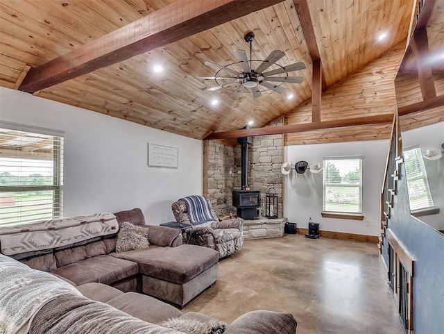 living room featuring ceiling fan, high vaulted ceiling, wooden ceiling, beamed ceiling, and a wood stove