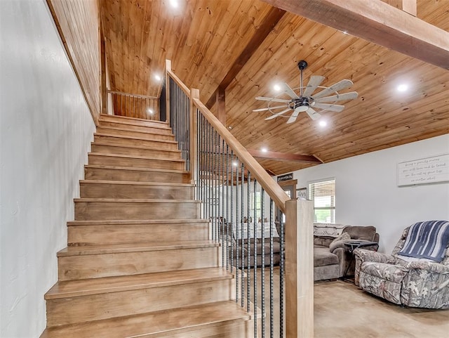 stairway with ceiling fan, wood ceiling, high vaulted ceiling, and beamed ceiling