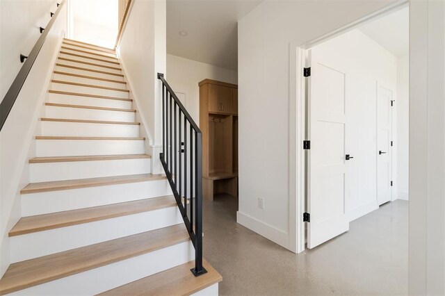 staircase with baseboards