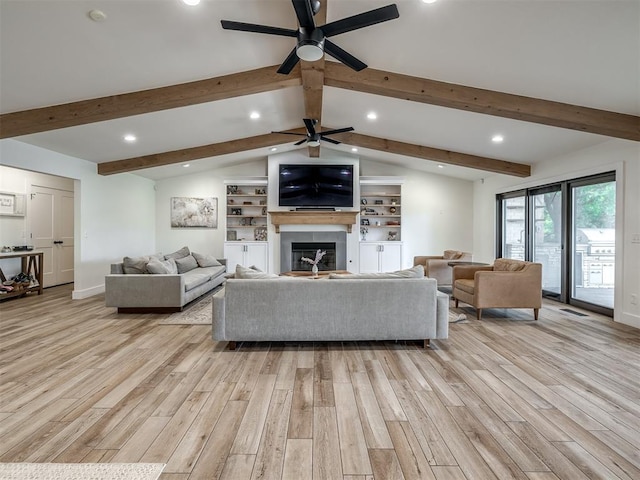 living room with lofted ceiling with beams, light hardwood / wood-style flooring, and ceiling fan