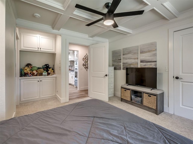 unfurnished bedroom featuring beam ceiling, ceiling fan, and light colored carpet