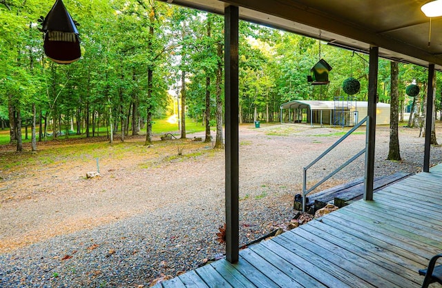 exterior space with a carport