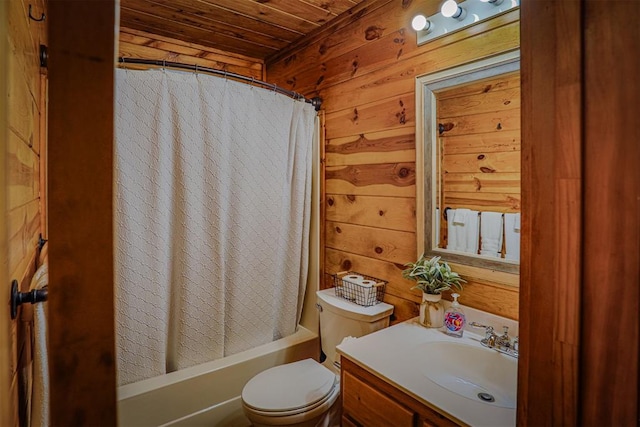 full bathroom with wooden walls, vanity, wood ceiling, and toilet