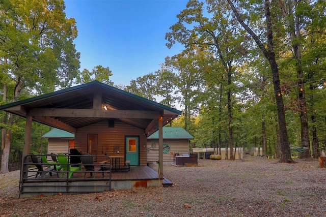 rear view of house with a deck