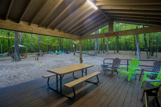 surrounding community with a wooden deck