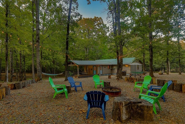 exterior space featuring a fire pit