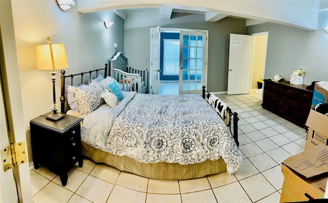 tiled bedroom with french doors