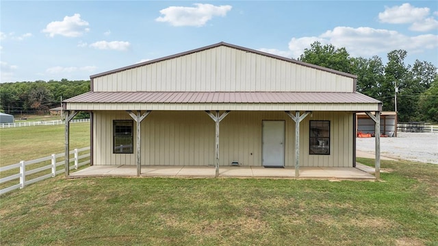 view of front of property featuring an outbuilding