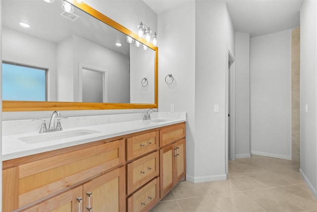 bathroom with vanity and tile patterned floors