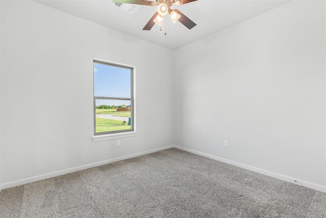 spare room featuring carpet floors and ceiling fan