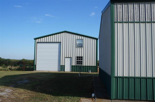 view of outbuilding with a garage