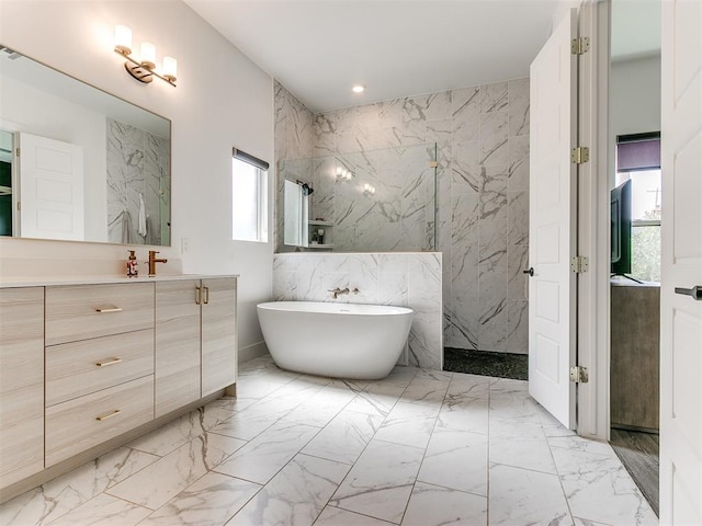 bathroom with vanity, tile walls, and plus walk in shower