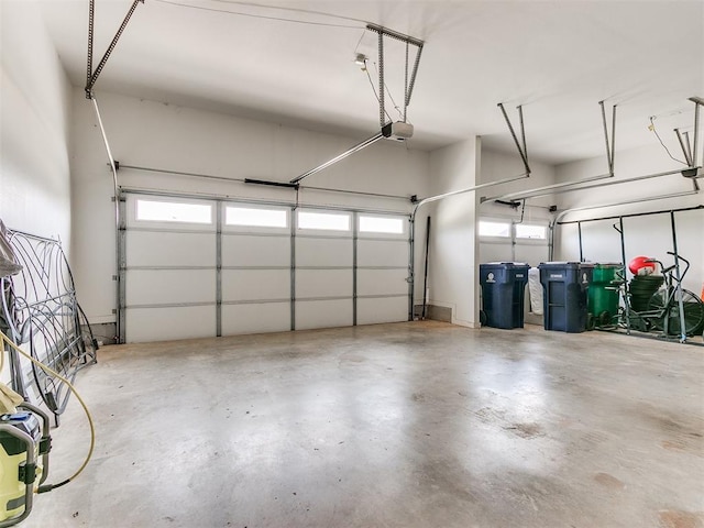 garage featuring a garage door opener