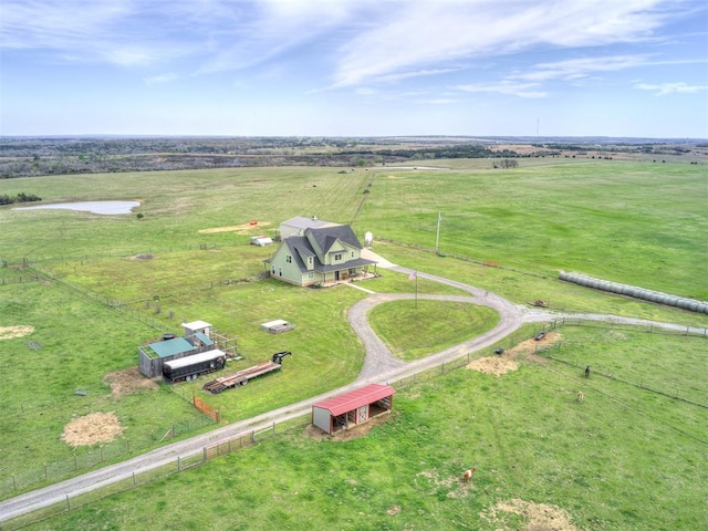 birds eye view of property featuring a rural view