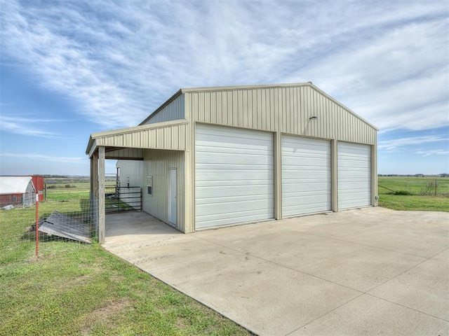 garage featuring a yard