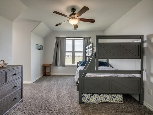 bedroom with ceiling fan, carpet, and vaulted ceiling