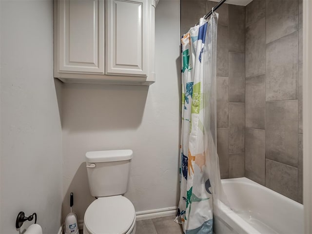 bathroom with toilet and shower / tub combo with curtain