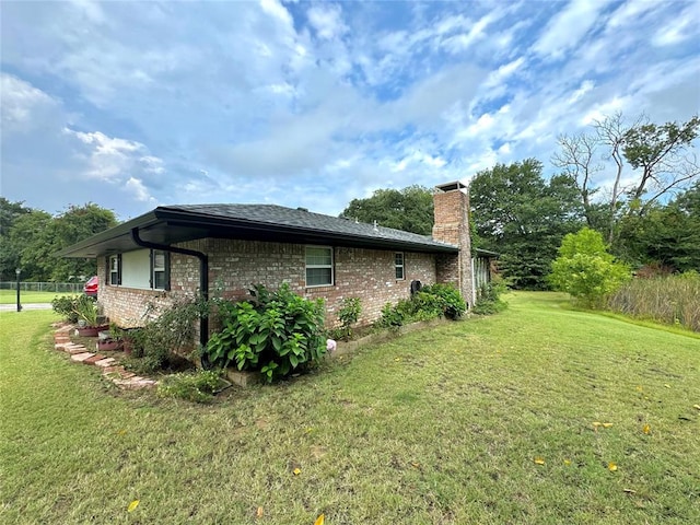 view of property exterior featuring a yard