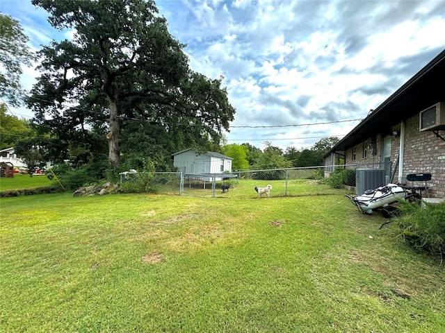 view of yard with central AC