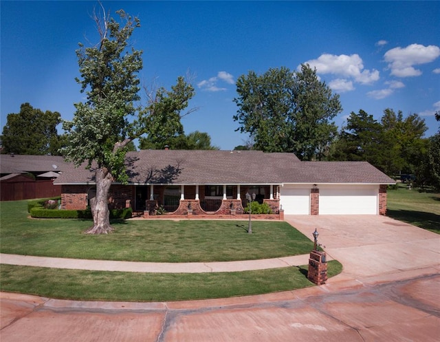 ranch-style home featuring a front yard and a garage