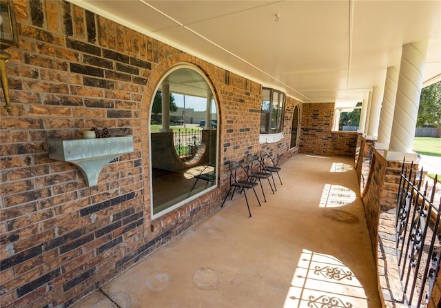 view of patio featuring a porch