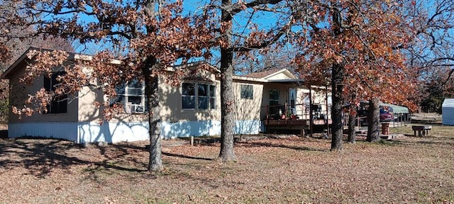 33308 S Post Office Nck, Shawnee, OK 74801 - manufactured / mobile home with a wooden deck