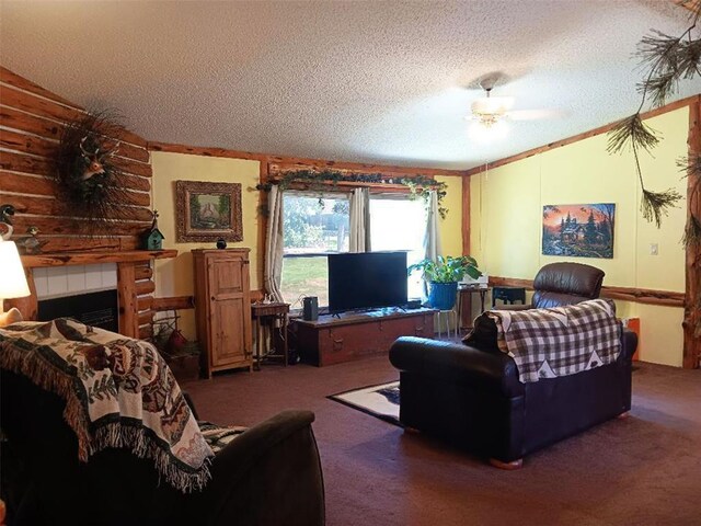 33308 S Post Office Nck, Shawnee, OK 74801 - carpeted living room featuring a textured ceiling, ornamental molding, a fireplace, and a ceiling fan