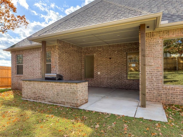 rear view of property with a patio