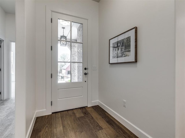 entryway with dark wood-type flooring