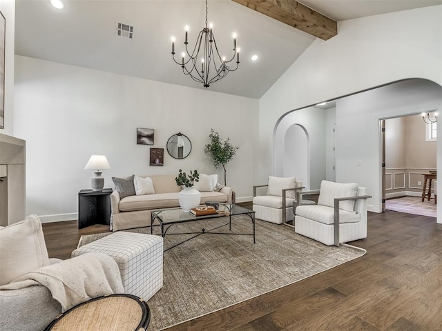 living room with beamed ceiling, an inviting chandelier, high vaulted ceiling, and dark wood-type flooring