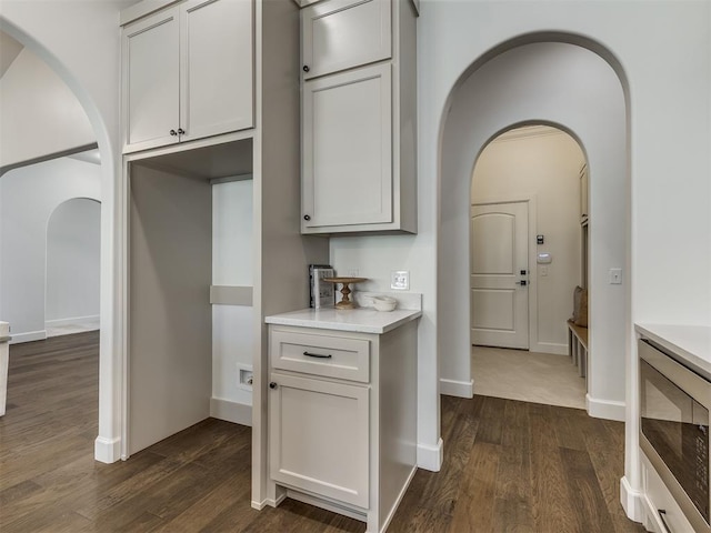 kitchen featuring dark wood-type flooring