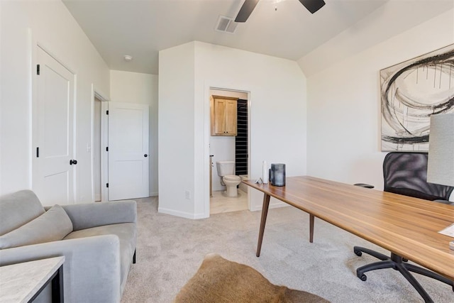 home office with light carpet and ceiling fan