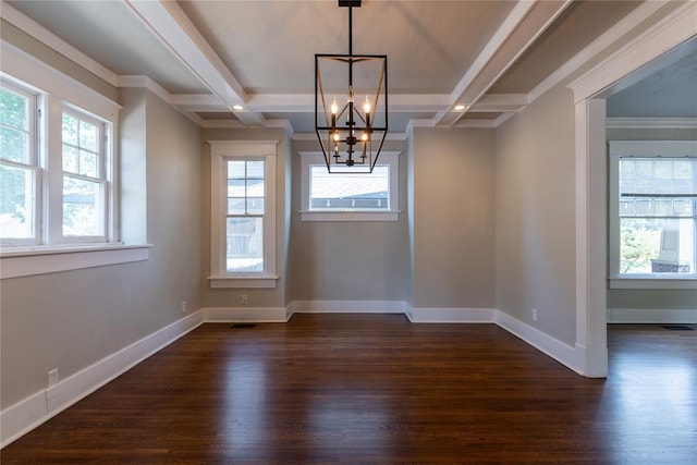 empty room with beamed ceiling, dark hardwood / wood-style floors, a chandelier, and crown molding