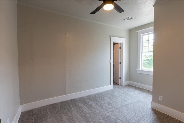 carpeted empty room with ceiling fan