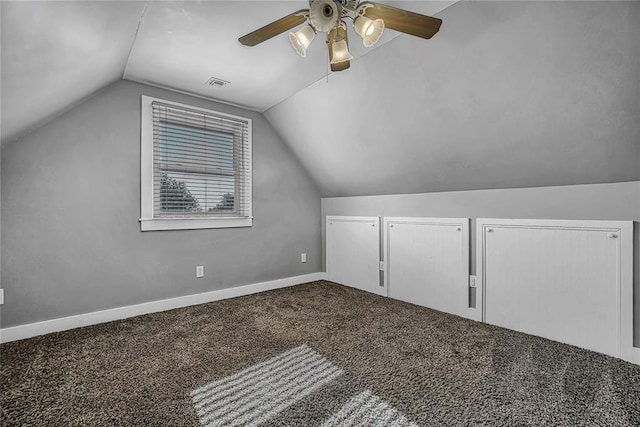 bonus room with ceiling fan, carpet floors, and lofted ceiling