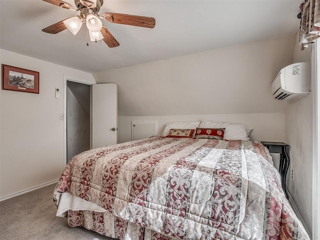 carpeted bedroom with an AC wall unit, ceiling fan, and vaulted ceiling