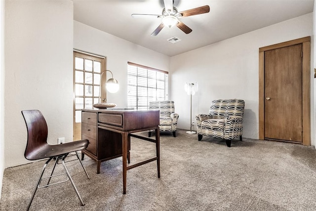 home office featuring ceiling fan and carpet floors