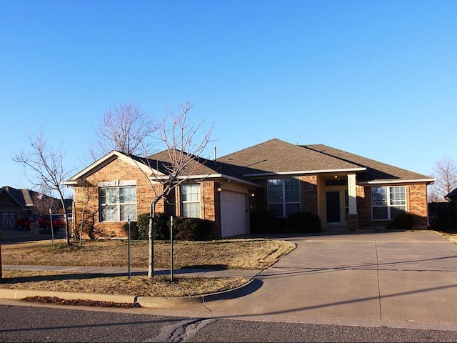 single story home with a garage