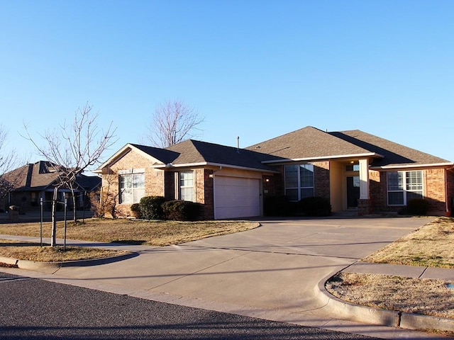 ranch-style home featuring a garage