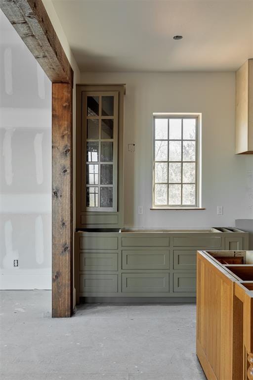 interior space with unfinished concrete floors