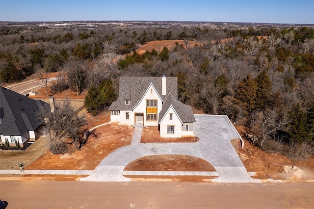 aerial view with a wooded view