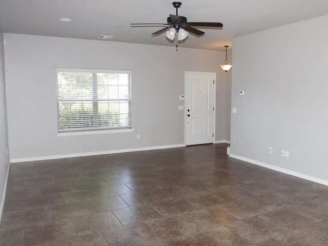 empty room with ceiling fan