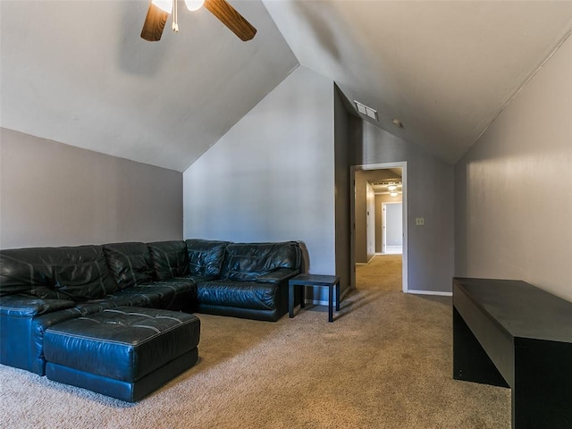 living room with ceiling fan, carpet floors, and lofted ceiling