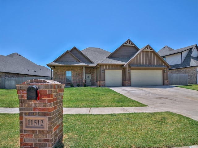 view of front facade featuring a front yard and a garage