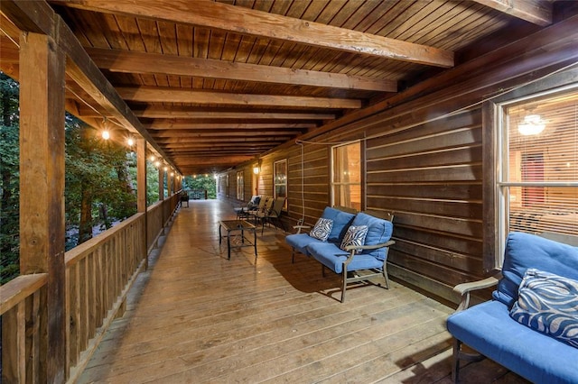 wooden terrace featuring outdoor lounge area