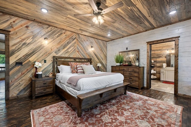 bedroom featuring ceiling fan, wood walls, dark hardwood / wood-style flooring, and wood ceiling