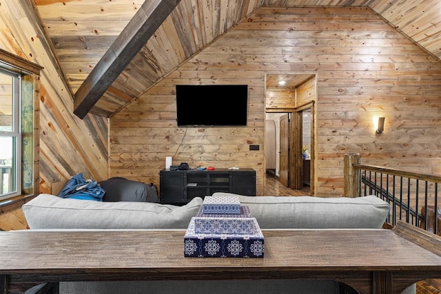 unfurnished living room with wooden ceiling, lofted ceiling, and wood walls