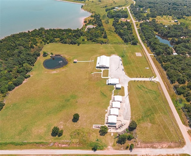 drone / aerial view with a rural view and a water view