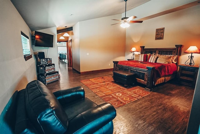 bedroom with dark hardwood / wood-style floors, vaulted ceiling, and ceiling fan