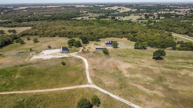 birds eye view of property featuring a rural view